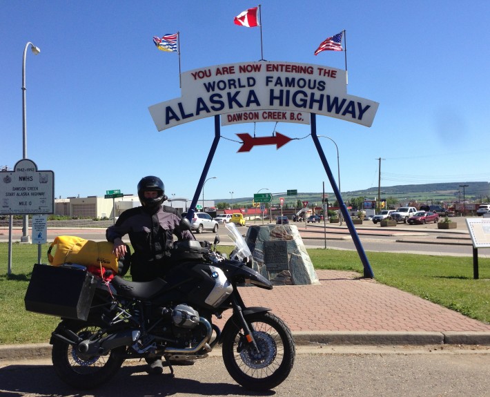 Scott G. Nelson at mile zero of the Alaska Highway