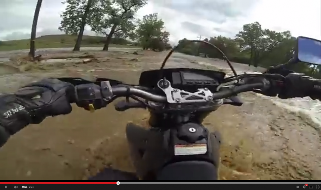 Motorcycle Tries to Cross Flash Flood